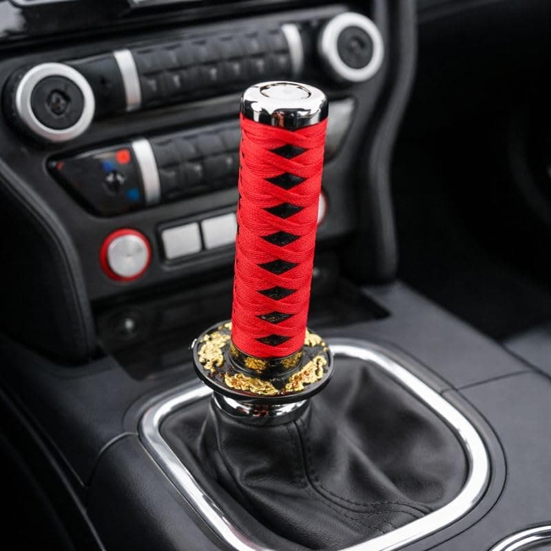 - YOURKARTS.COM Car Gear Knob Katana Design – 20CM Red Sword Handle | Universal Samurai Shifter Stick | Premium Metal Build for Cars, SUVs & Tuners | Modified Look Upgrade | car Accessories 2025