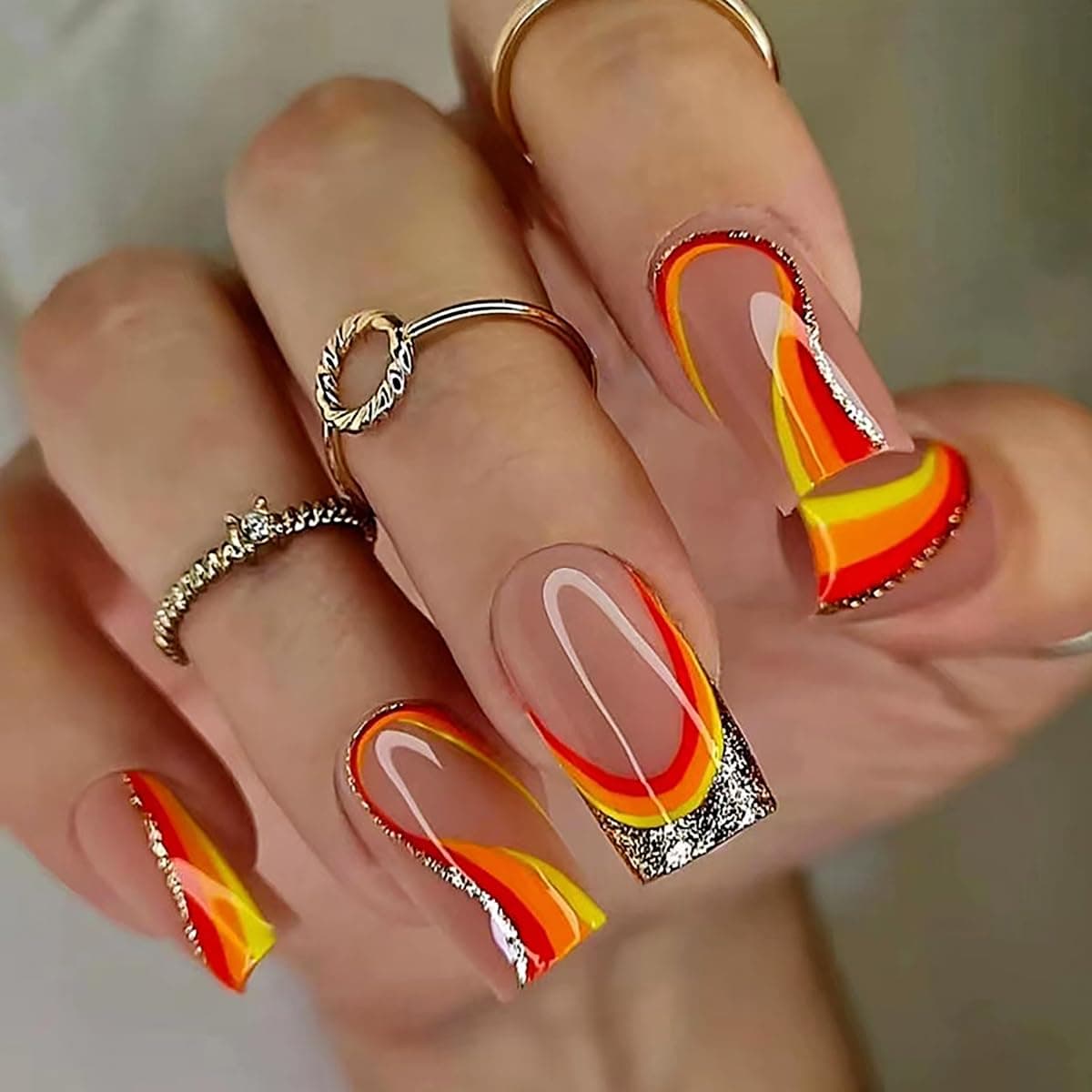 24 Pcs Press on Nails Square Fake Nails Medium Short French Acrylic Nails with Warm Red Yellow Orange Patchwork Ripple Curve Glitter Full Cover Designs Stick on Nails Artificial Nails for Women and Girls