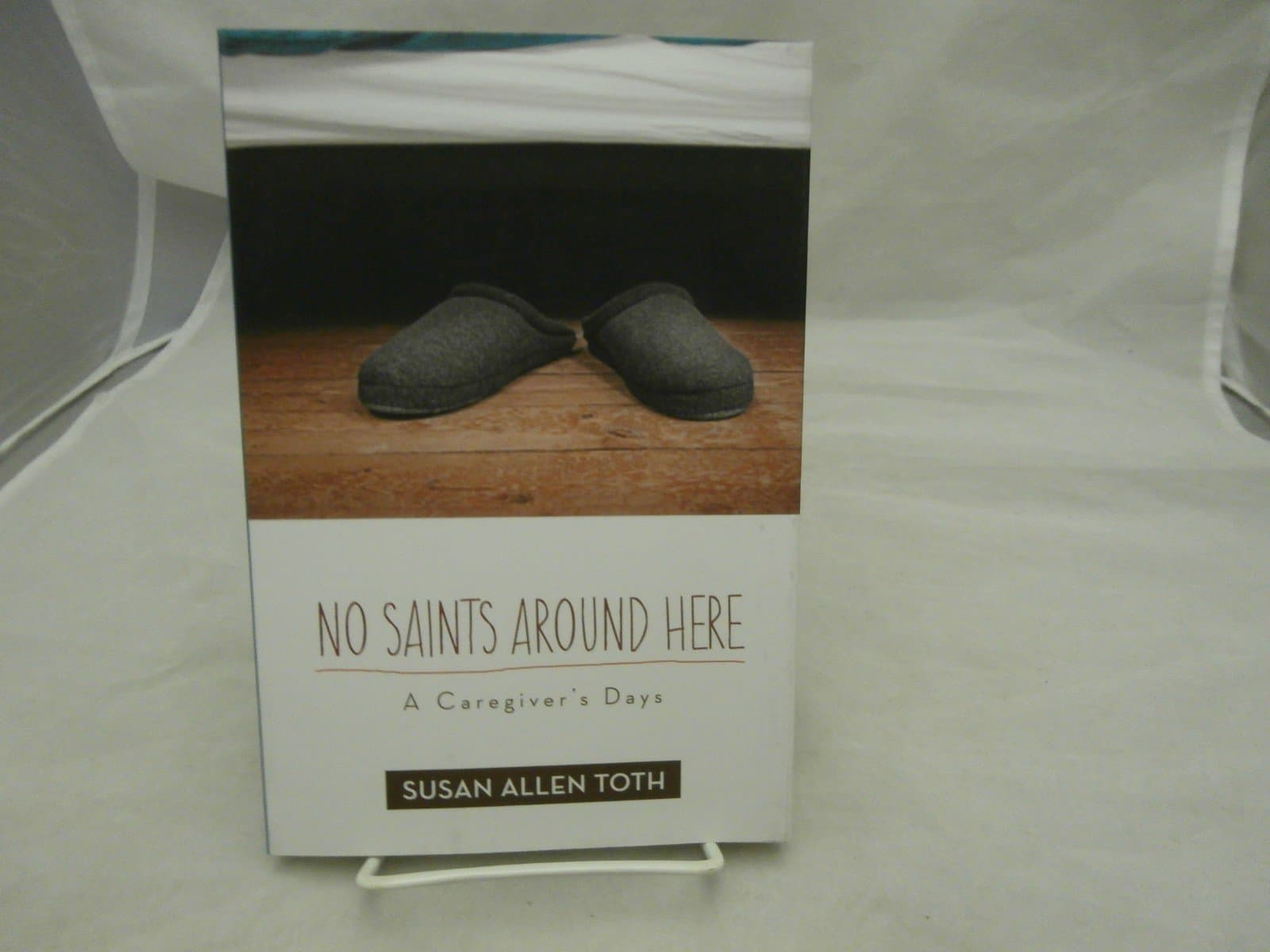 No Saints around Here: A Caregiver's Days Paperback – April 14, 2014