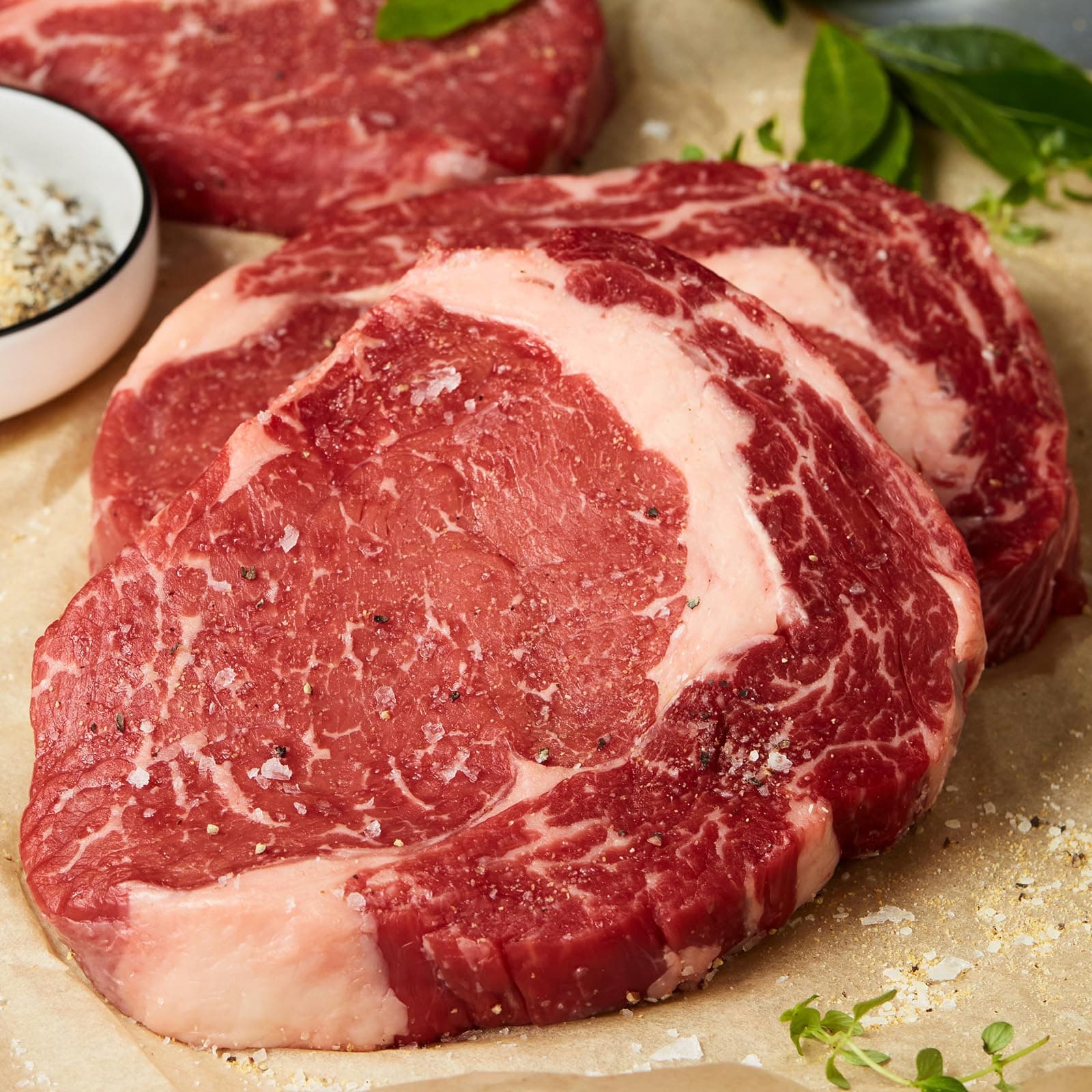 Premium Gift Boxed USDA Prime Ribeye Steaks - Wet-Aged to Perfection with Cooking Instructions - Steak Lover's Delight. Includes 4 Steaks, 10 oz. each, from Kansas City Steak Company.