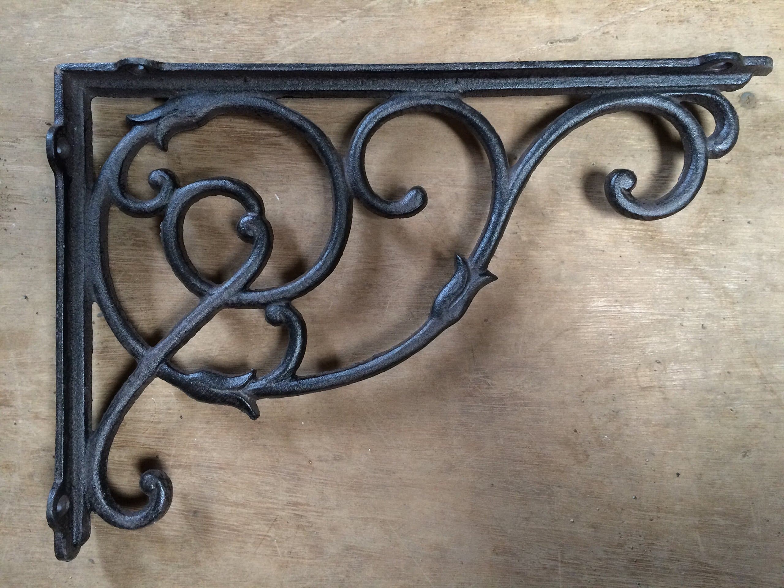 Large antique Victorian style ornate iron hanging basket & shelf bracket
