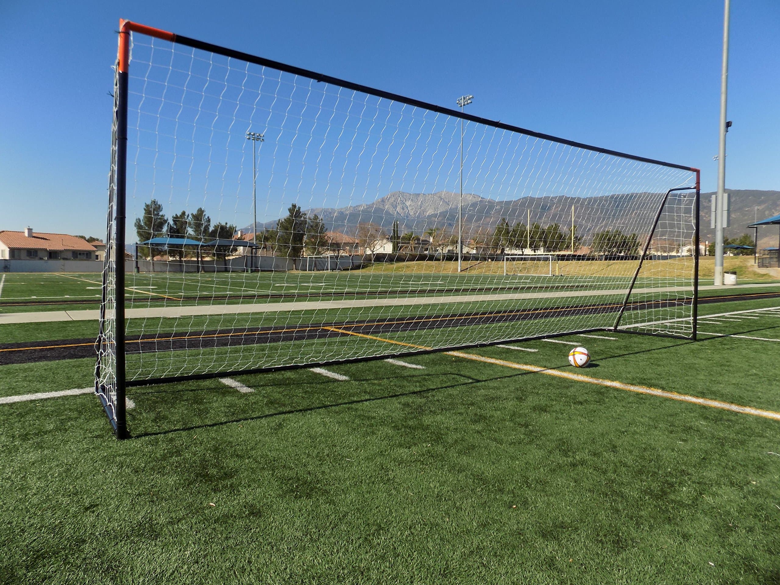 24 x 8 Ft.Regulation Size Soccer Goal w/Weatherproof HDPE Net. 50MM Diameter Industrial Grade Black Powder Coated Galvanized Steel. Portable 8x24 Foot Training Aid. ONE Year Warranty!